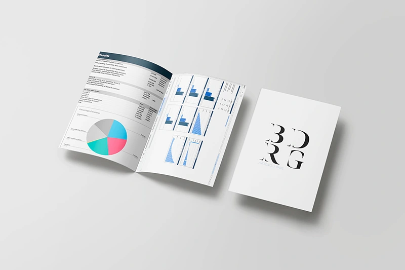 Damien Digital, design UXUI, designer, BDRG Avocats Paris, mockup brochure dépliant ouverte pages intérieures graphiques et tableaux de résultats, couverture logo BDRG noir, fond gris clair